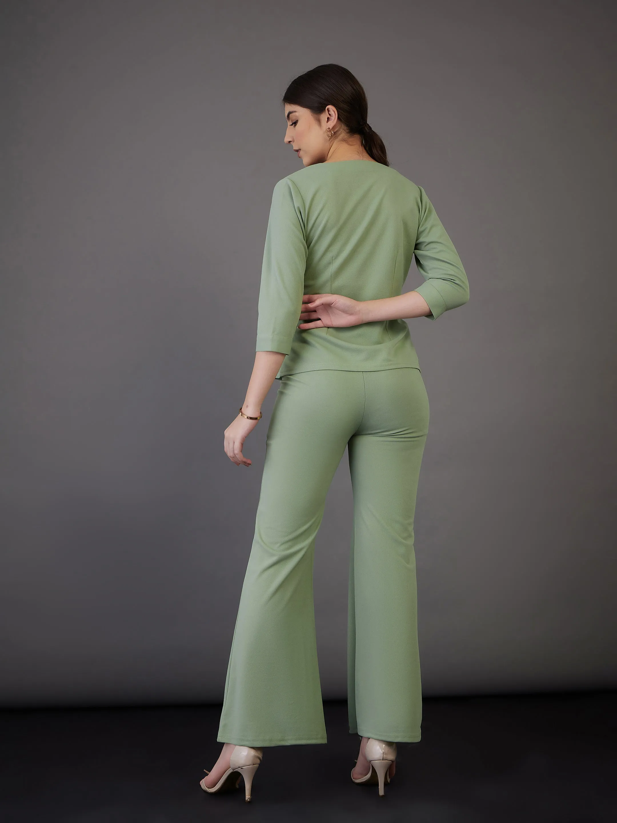 Women Green Wrap Asymmetric Top With Bell Bottom Pants